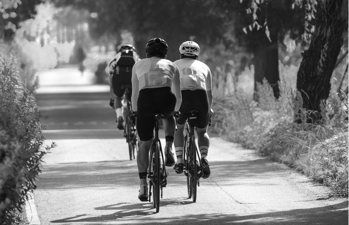 Men cycling outdoors powered by Crea-tor™ creatine and taurine from ME MAINTAIN | EXTEND® to boost explosive power and endurance.