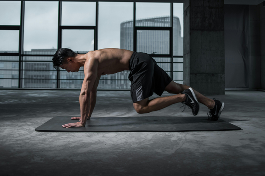 Man doing mountain climbers after taking Crea-tor™ creatine and taurine for improved strength, power, and recovery.